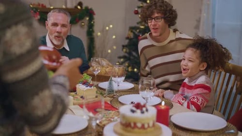 Family Gathered for Christmas Holiday Meal at Home