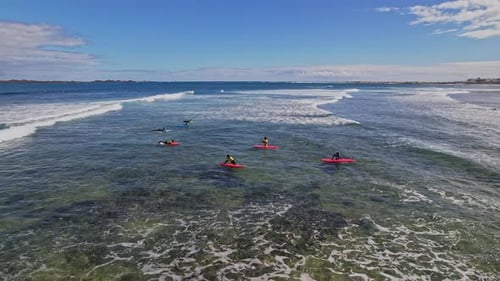 Surfers in the ocean in Canary Islands People enjoying surfing