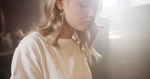 Musician Playing Piano in Recording Studio