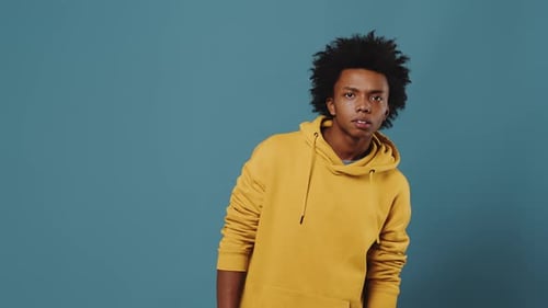 Young Man Expressing Surprise and Joy