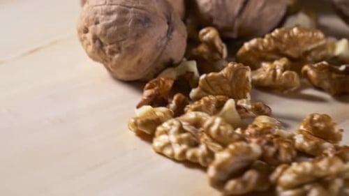 Walnuts On Wooden Plate