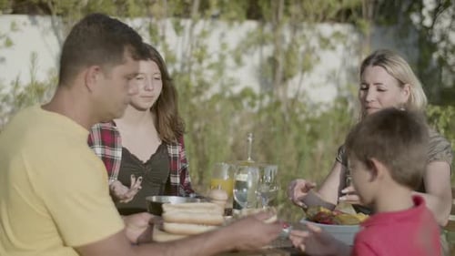 Family meal in a garden