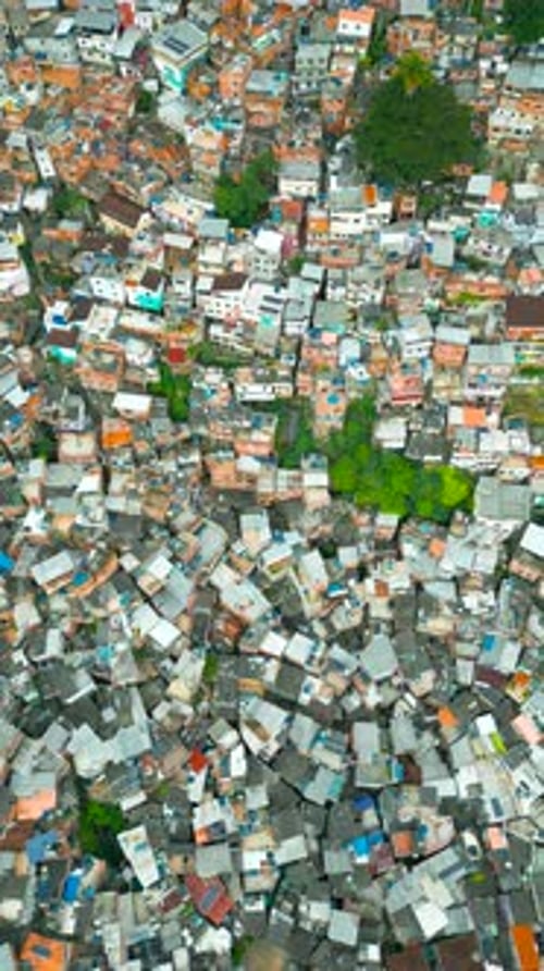 Aerial Top View of Favelas Dense Urban Settlement in Rio De Janeiro Showcasing Tightly Packed Houses