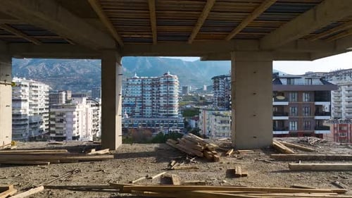 Aerial Video A Construction Site in Progress with Workers and Heavy Machinery Actively Building a