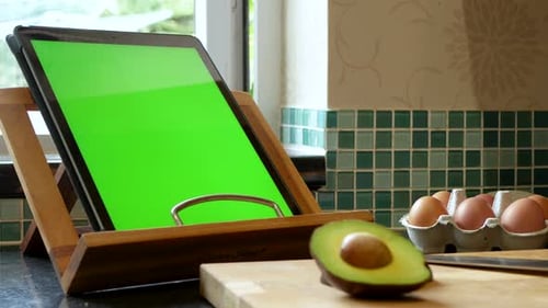 Cooking/ baking preparation with a green screen tablet recipe