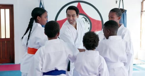 Karate Students and Instructor Doing Team Building Exercise