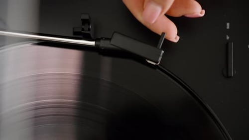 Vinyl Record Playing on a Turntable, Close Up