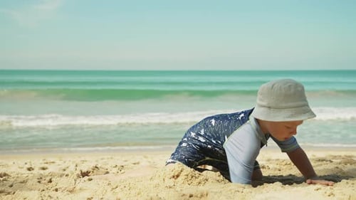 Young Child Playing on the Beach