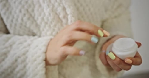 Hand Cream Close Up Young Woman with Perfect Skin Applying a Day Night Cream on Her Previously