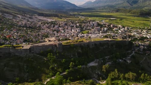 View at Gjirokaster old town city and Gjirokaster Citadel or castle with blue sky in the background