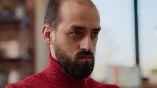 Company Employee Analyzing Financial Charts and Graphs