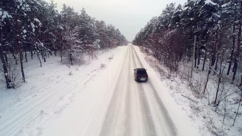 Driving Through The Winter Forest Snow Drifts On The Road