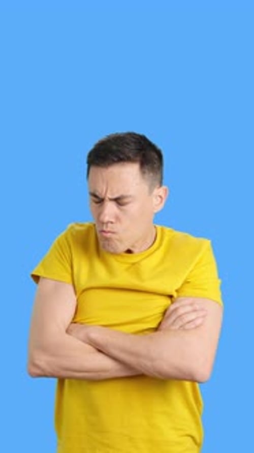 Man Looks Angry with Arms Crossed, Portrait