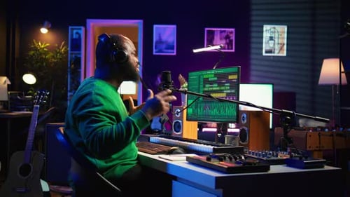 Artist Producer Singing a New Song to Record on Microphone
