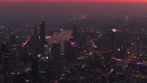 Bangkok's Vibrant City Skyline at Night High Rise Buildings and Structures Illuminate Cityscape