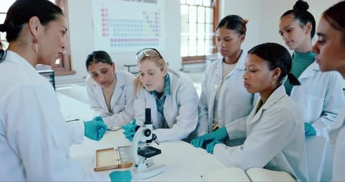 Classroom, university and professor with students, science and research with conversation