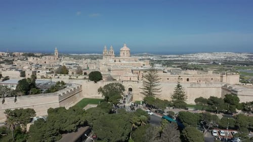 Drone Shot of the Fortification Walls, Ditch and Medieval City of Mdina, in the Maltese Islands