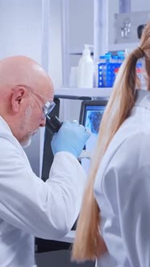 Scientists Working in Modern Lab