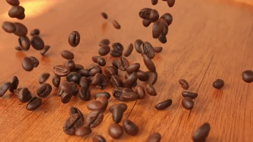 Kollision zweier Ströme gerösteter Kaffeebohnen in Zeitlupe