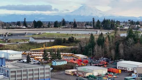 Daytime Traffic On Nalley Valley Road Bridge In Tacoma, Washington. Mount Rainier In Background.