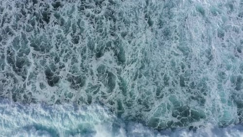 Waves in the Ocean Top View The Sea Water is Foaming
