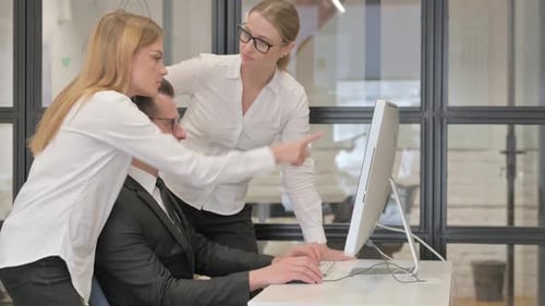 Business People Working on Computer in Office