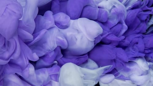 Ethereal Elegance Blue Ink Cloud in Fluid Water on Black Background