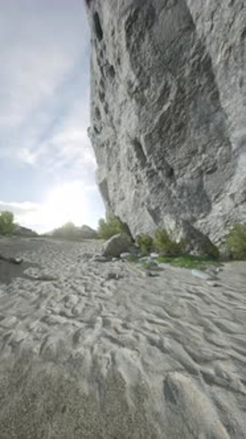 Rock Formation Among Sandy Terrain