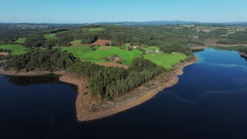 Aerial View of River Through Lush Countryside