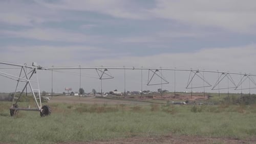 Farming equipment along the side of the interstate