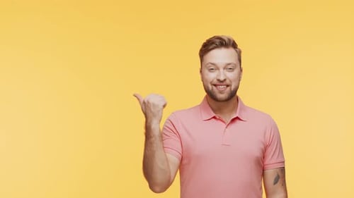 Expressive Young Man Over Vibrant Background Studio Portrait of Handsome Person