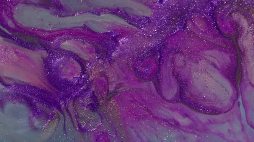 Glittering Fluid Art: Abstract Swirls of Purple and Gold