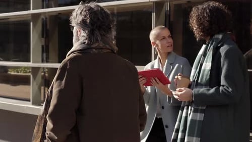 People Meeting and Discussing in Urban Workplace