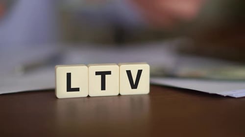 Close Up of Block Letters Spelling LTV