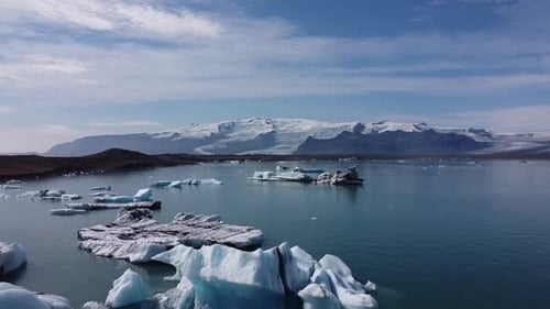 Jokulsarlon Glacier Lagoon in Iceland, aerial view over icebergs