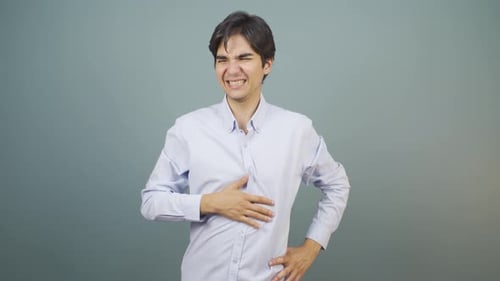 Man experiencing stomachache.