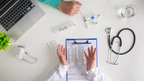 Doctor Consulting Patient About Treatment Options