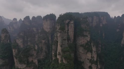 Drone shot of Zhangjiajie national park in China, karst mountains all over the place