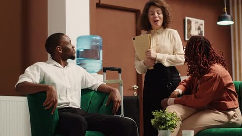 Hotel Manager Greeting Tourists