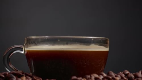 Coffee Cup Close Up with Coffee Beans Zooming In