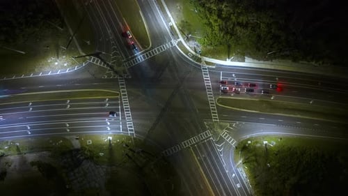 Aerial View of American Wide Multilane Street Intersection with Traffic Lights and Moving Cars at
