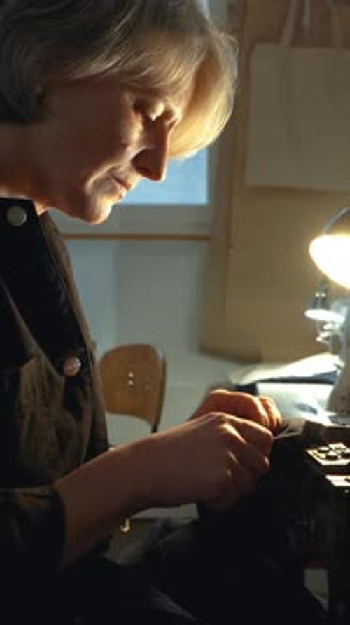 Woman Crafting Item in a Workshop