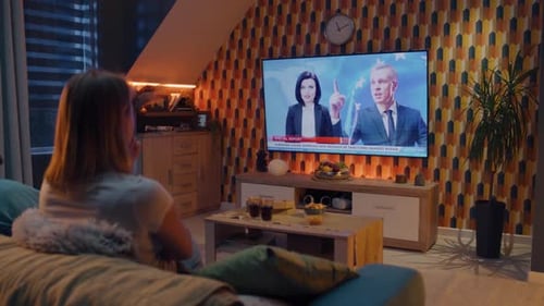 Couple Watching Politics News About Sanctions