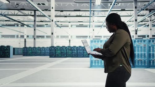 Data Center Computer Scientist Upgrades Server Infrastructure Using Green Screen Laptop