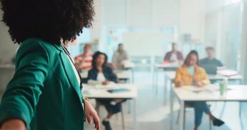 Instructor Presenting to a Class of Students