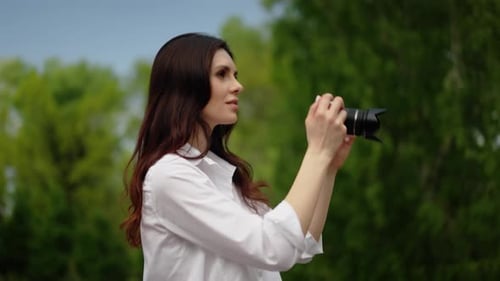 Portrait of Cheerful Beautiful Female in Good Mood with Camera Making Photos of City Happy Pretty