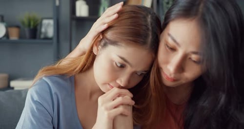 women teenager embracing to calm her sad best friends from feeling down from breakup.