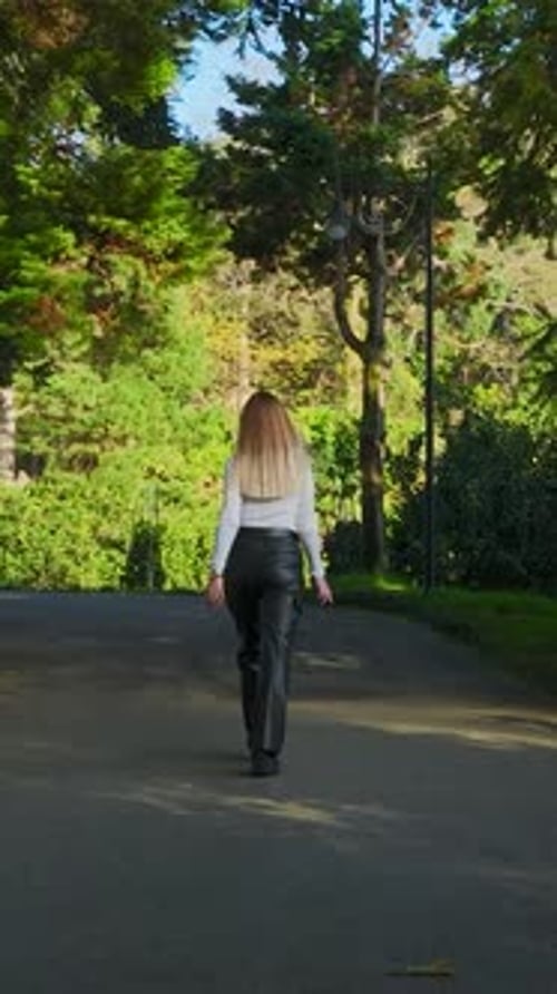 Vertical Video Aerial Batumi Stroll ModelLike Girl's Autumn Park Beauty