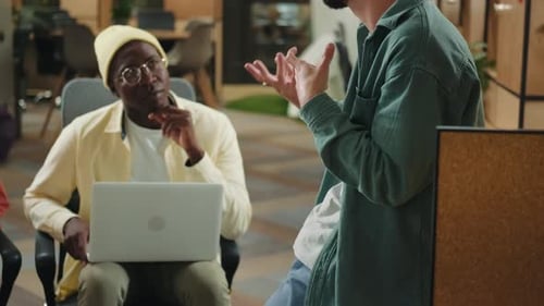 Multiethnic Business Team of Coworkers are Discussing a Project in a Modern Office