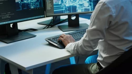 Computer Scientist Using AI Tech on PC to Do Checkup in Server Room